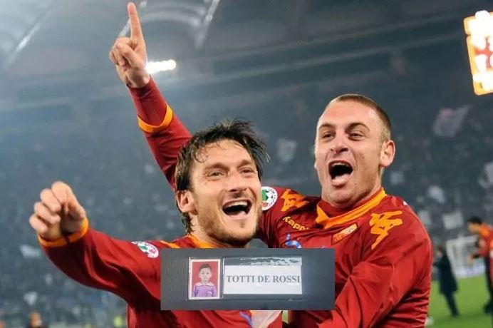 LEGENDA— Aksi Francesco Totti dan Daniele De Rossi semasa bermain bersama AS Roma di Serie A.