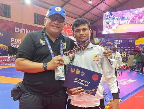 OPTIMIS— Ketua PGSI Sumbar, Andree Alqamar optimistis gulat bisa menyumbangkan medali bagi kontingen Sumbar di arena Pekan Olahraga Nasional (PON)XXI Aceh-Sumut.