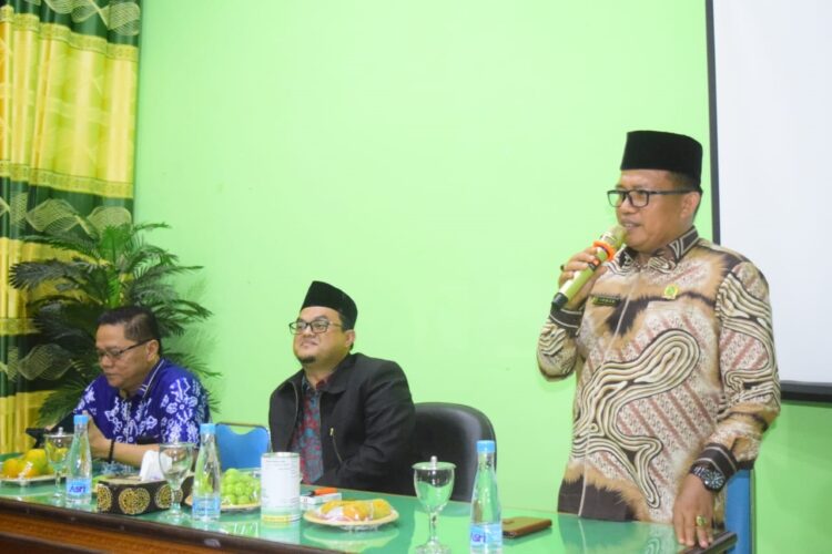 KUNJUNGAN— Kakan Kemenag Limapuluh Kota H Irwan bersama Kepala Baznas Limapuluh Kota, Yulius saat menyambut kedatangan Kakan Kemenag Sawahlunto.