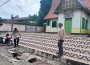 Dinas PUPR Solsel Tinjau Trotoar Ambruk di Depan Balai- Balai Adat Nagari Koto Baru