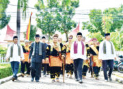 Peringatan Hari Jadi ke-33 Lubuk Basung, Bupati Agam Ikuti Arak- Arakan dan Makan Bajamba