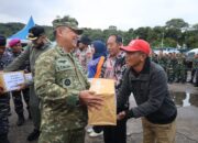 Sambut Hari Jadi, Kodaeral II dan Pemko Gelar Aksi Bersih Batang Arau hingga Pengobatan Gratis
